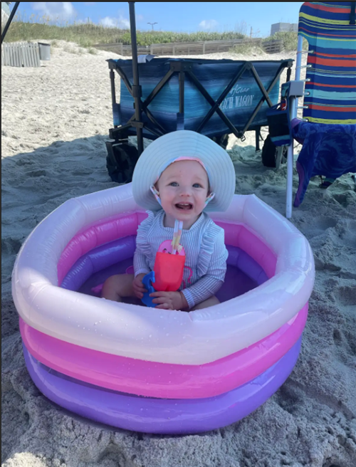 Baby in pool at the beach